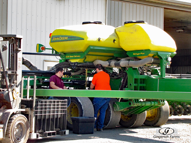 Emptying planter at Gingerich Farms