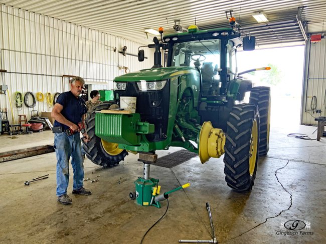 Changing tires on sidedress at Gingerich Farms