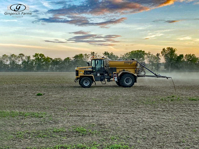 Spreading fertilizer - Gingerich Farms