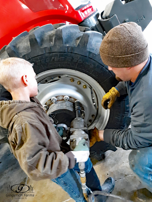 Changing tire at Gingerich Farms